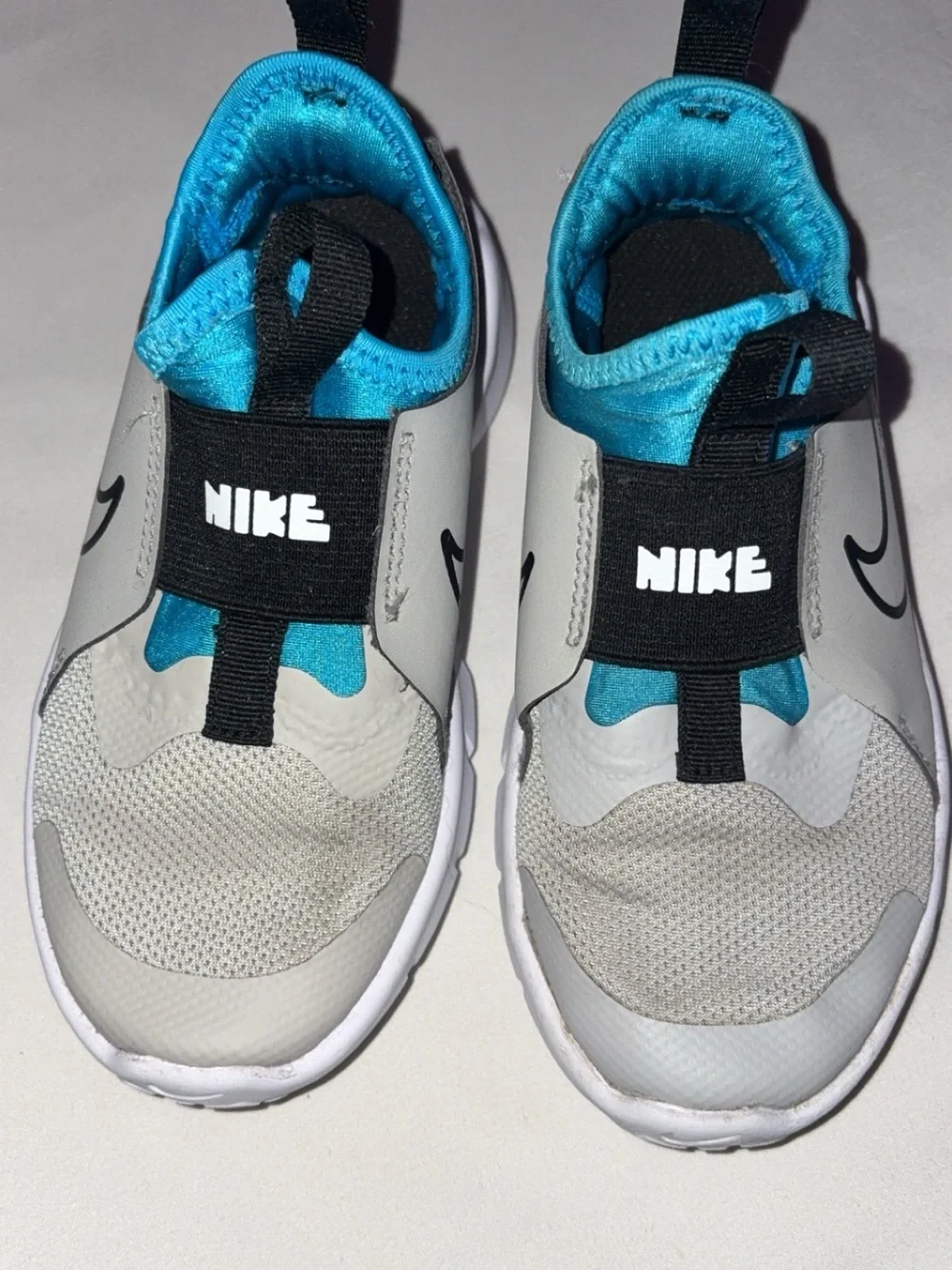 Nike Kids Slip-On Sneakers in Gray and Bright Blue